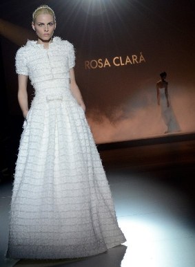 Bosnian model Andrej Pejic wears two wedding dresses on the runaway for Rosa Clara