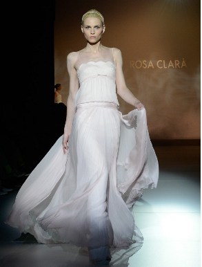 Bosnian model Andrej Pejic wears two wedding dresses on the runaway for Rosa Clara biography