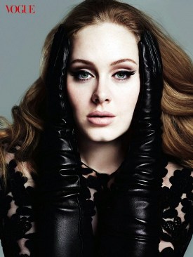 Grammy awarded singer Adele lands on Vogue\'s cover, March issue biography